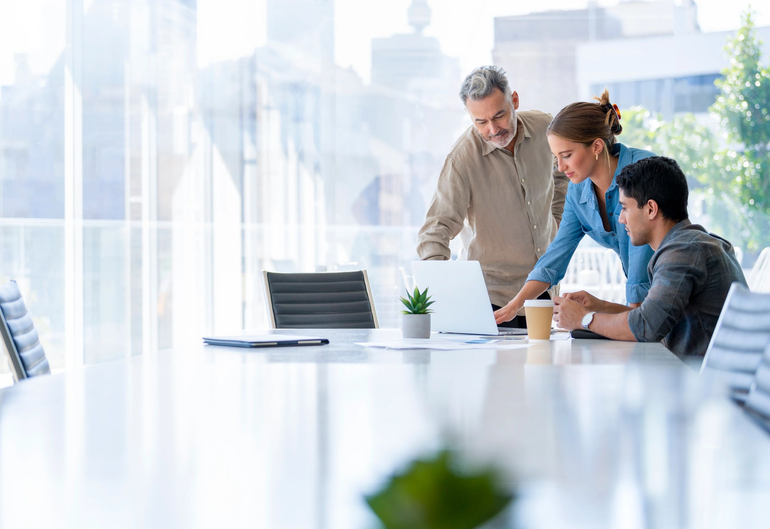 Professional team collaborating in a board room