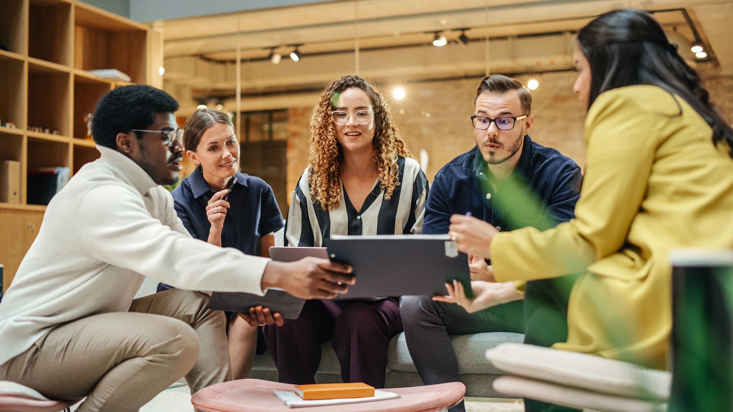 Team collaborating on blockchain strategy in a modern office